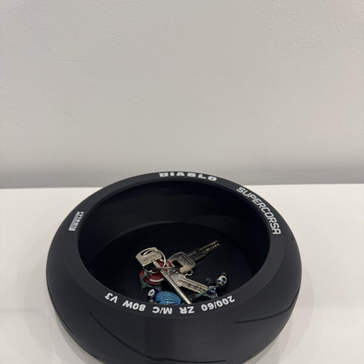 Svuotatasche – Replica Pneumatico Posteriore Moto